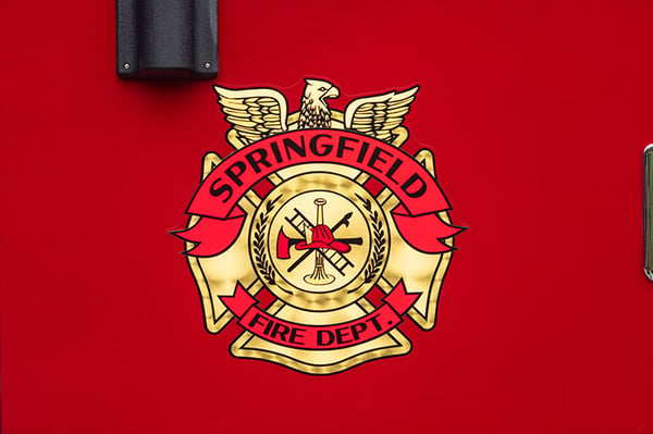 Springfield Fire and Emergency Serivces graphic on the crew cab door of a fire truck.