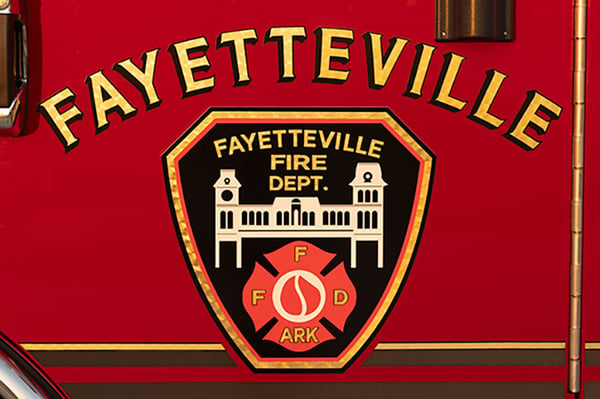 Fayetteville Fire Department's patch on the crew cab door of their fire truck.