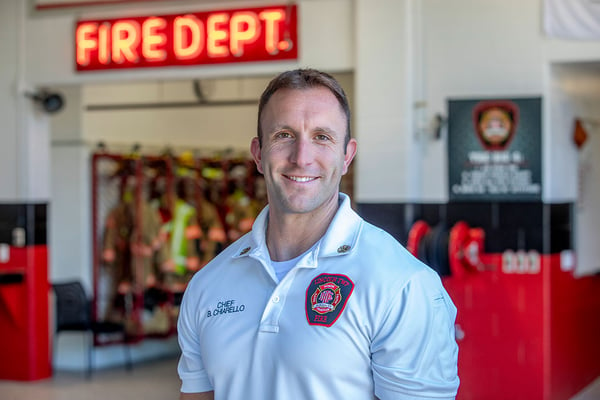 The Lincoln Township Fire Department fire chief posed in the fire station.