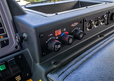 Easy to reach cab controls and switches on a fire truck dashboard.